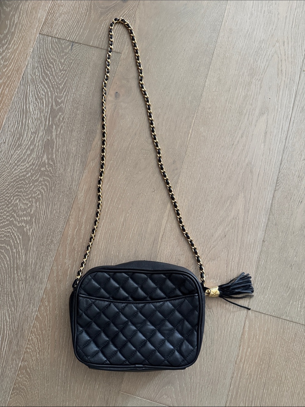 Excellent condition Quilted Black Crossbody Bag with Gold-Tone Chain and Tassel
